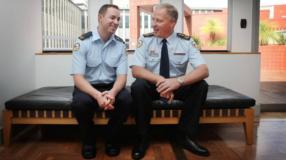 Tony Graham, right, with ACT SES member Adam Manning at the 2010 Community Protection Awards. Photo by Andrew Sheargold