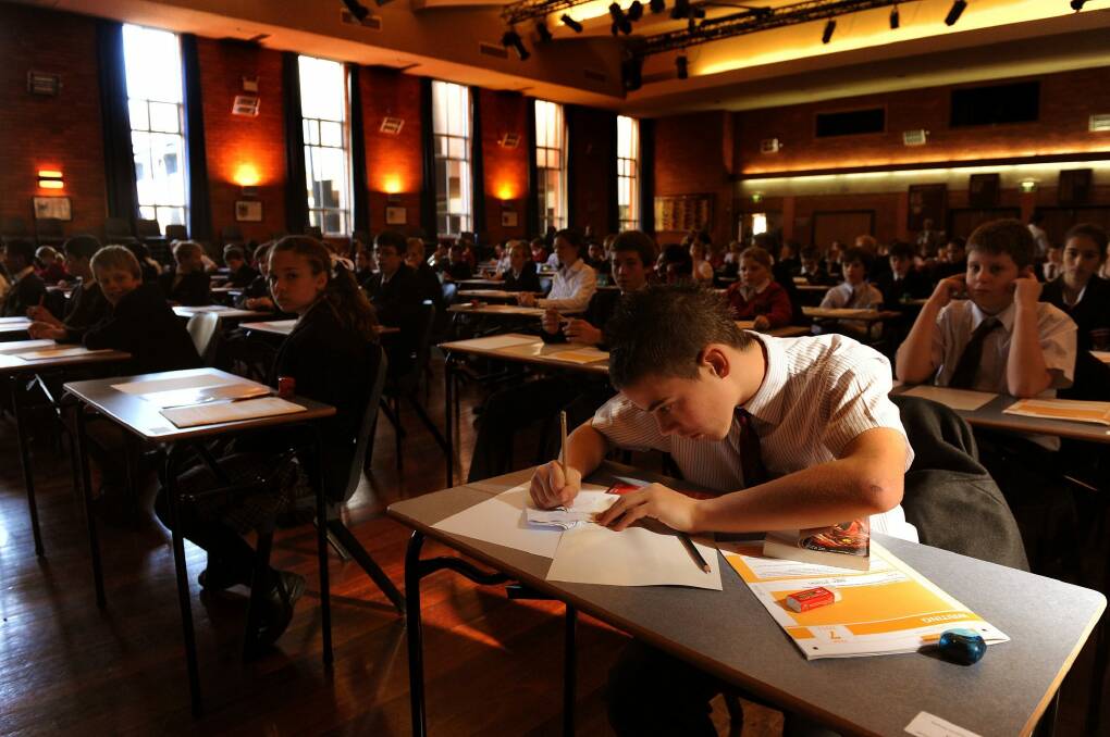Daramalan College students sit the national literacy and numeracy test in 2011. Photo: Gary Schafer