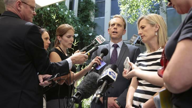 ACT Attorney General Simon Corbell MLA and Chief Minister Katy Gallagher MLA speak to the media in response to the High Court decision on the ACT's same-sex marriage laws at the Legislative Assembly. Photo: Jeffrey Chan