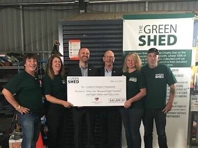 The Green Shed co-founders Tiny (Goran) Srejic, Elaine Stanford, Sandie Parkes and Charlie Bigg-Wither handing over the cheque with Chief Minister Andrew Barr and the deputy chair of the Canberra Hospital Foundation Tony Henshaw. Photo: supplied