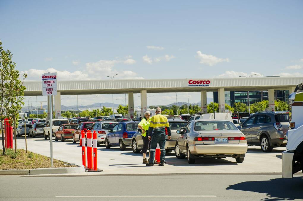 Cars crowd Costco at Majura Park on Thursday, as prices hit 95.7 cents per litre.
 Photo: Jamila Toderas