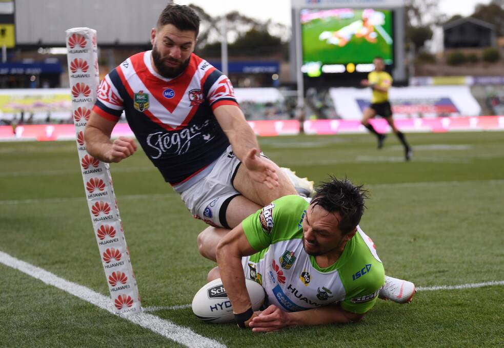 Jordan Rapana of the Raiders scores a try during the Round 23 NRL match between the Canberra Raiders and the Sydney Roosters at GIO Stadium in Canberra. Photo: AAP