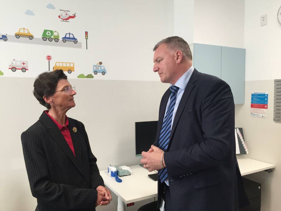Janet Anderson with director-general of ACT Health Michael De'Ath at the opening of a new walk-in health centre in Gungahlin. Photo: Finbar O'Mallon
