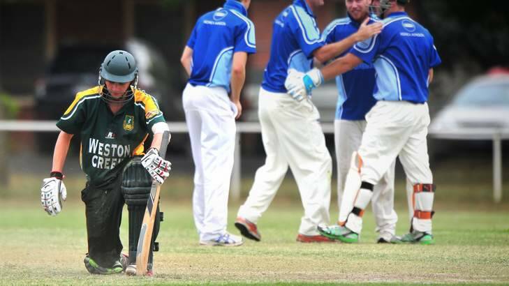 Weston Creek batsman Lewis Harman is disappointed to be run out for six. Photo: Katherine Griffiths