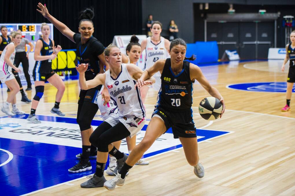 Canberra's Chevannah Paalvast gets round Adelaide's Natalie Novosel. Photo: Rohan Thomson