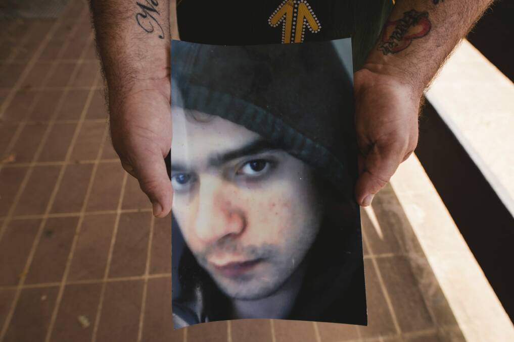 father of Jonathon Hogan holds a photograph of his son prior to his death at Junee prison. Photo: Jamila Toderas Photo: Jamila Toderas