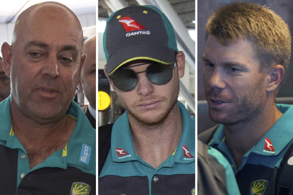 Darren Lehmann, Steve Smith and David Warner at the Cape Town International airport to depart to Johannesburg for the final five day cricket test match. Photo: AAP