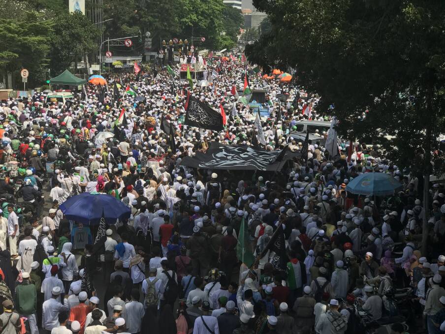 Thousands of protesters took to the streets of central Jakarta to demand jail for Sukmawati, the daughter and sister of two former Indonesian presidents. Photo: James Massola