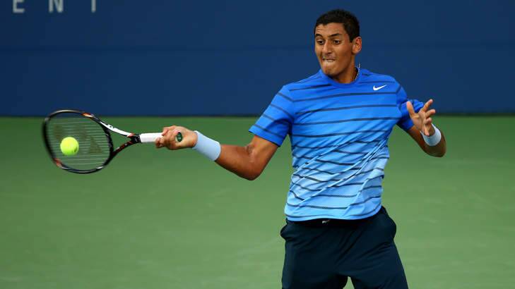 Canberra's Nick Kyrgios of returns a shot against David Ferrer of Spain during their first round men's singles match on day one of the 2013 US Open. Photo: Getty Images