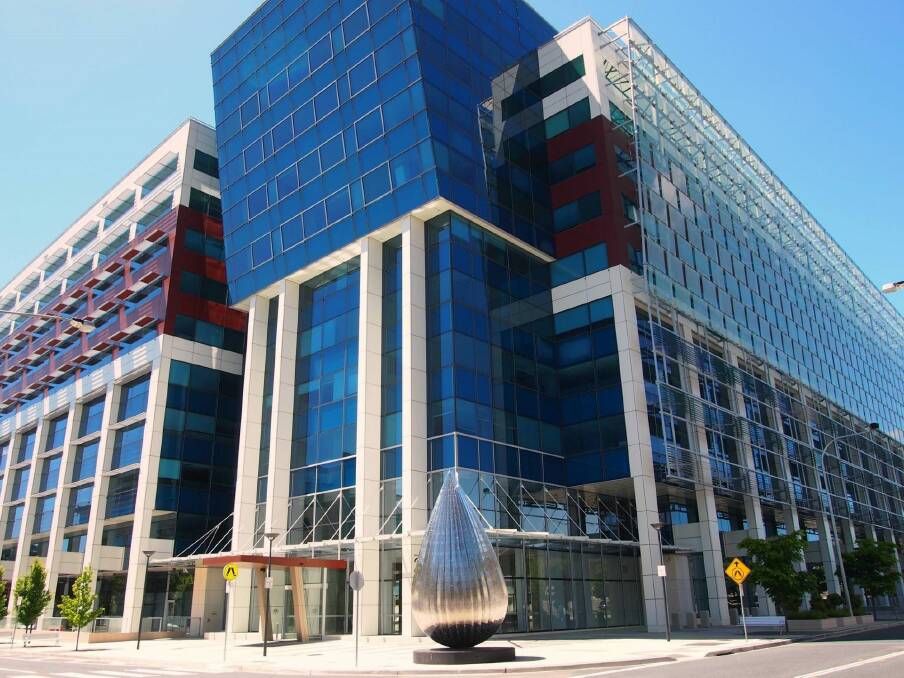 Woden's Sirius building, home to the Department of Health, formed part of the $1 billion Malaysian property deal.  Photo: act\meredith.clisby