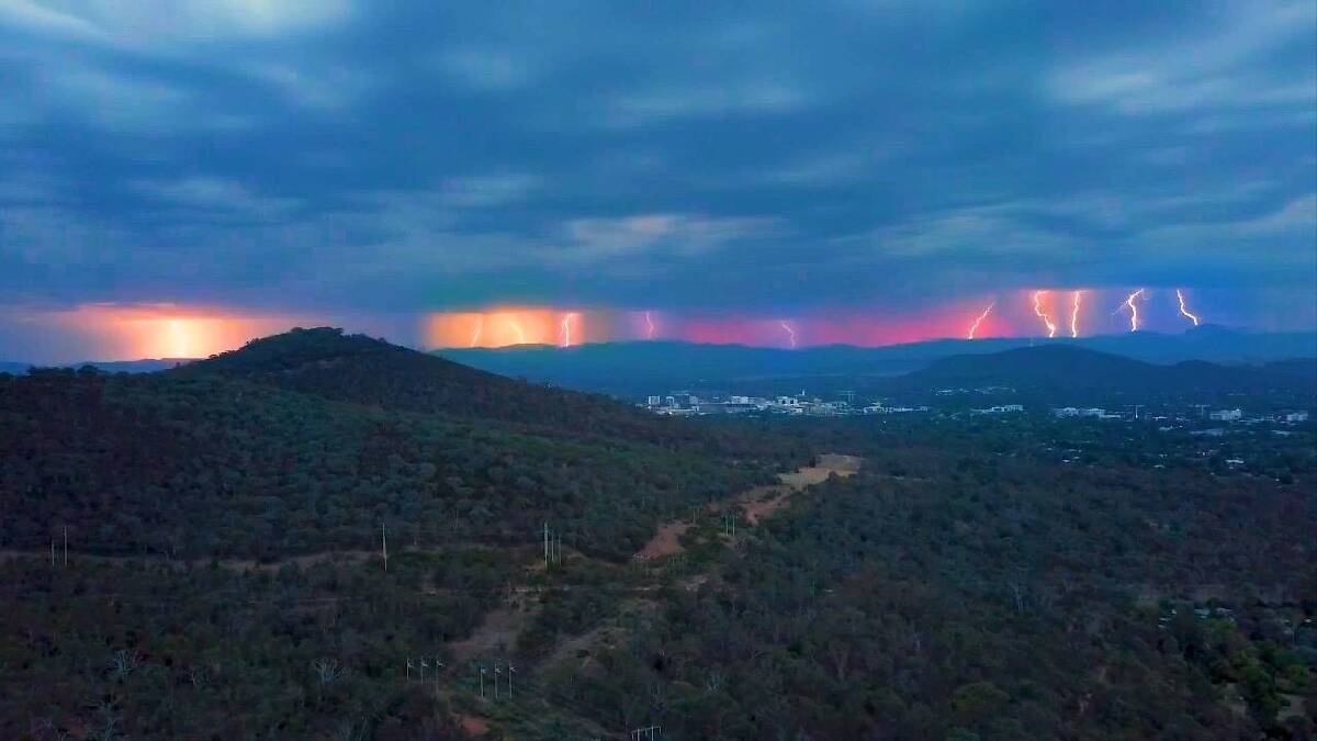 Canberra storm lights up the sky. Photo: BenjaminHogan