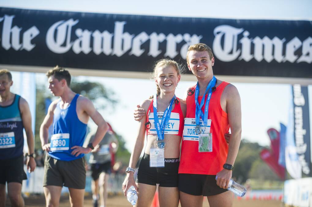 Canberra Times Fun Run 2018. Women's and Men's 1st place in the 10km run siblings Stephanie Torley and Josh Torley.   Photo: Photo: Dion Georgopoulos