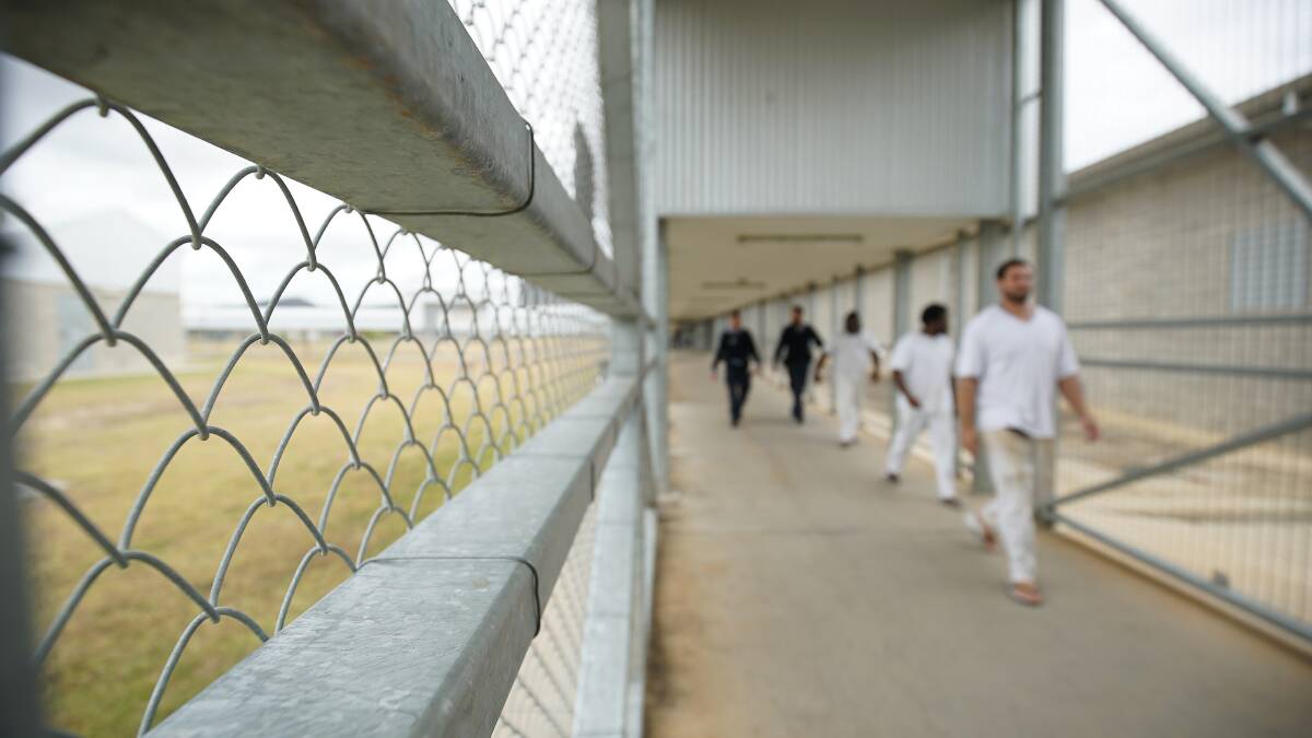 Staff escorting prisoners through Lotus Glen Correctional Centre. Photo: AAP Image/Human Rights Watch, Daniel Soekov