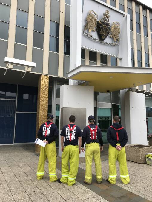 Firefighters outside the ACT Legislative Assembly, where they spoke to politicians this week about the industrial action they are taking against ACT Fire and Rescue. Photo: United Firefighters Union
