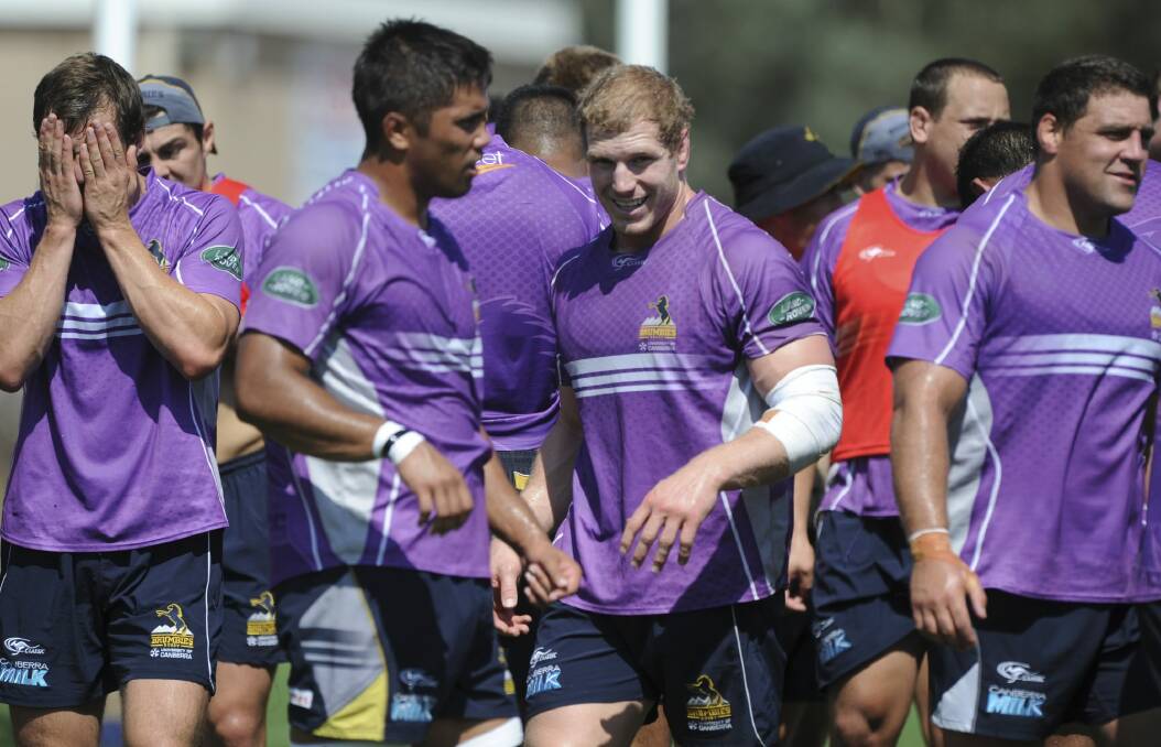 David Pocock, centre, will lead the Brumbies against the Queensland Reds. Photo: Graham Tidy