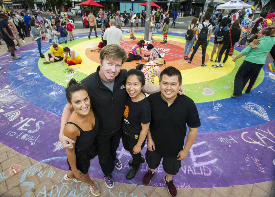 Braddon's United Retailers and Traders, Saloon Hair and Beauty's Sarah Wright, Kel Watt and Orr and Pop Intraprasit from Elemental Cafe would like to see the rainbow roundabout extend to other parts of the city.  Photo: Elesa Kurtz