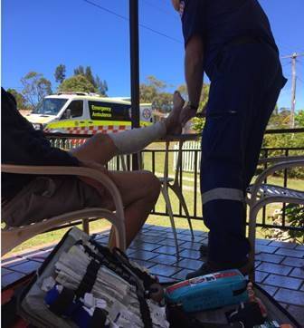 The man receiving treatment for cuts to his legs in the roo attack. Photo: NSW Ambulance Service