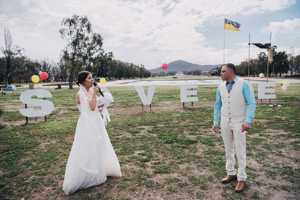 Kristie Simpson sang to her husband John as they came together at their wedding at the Tent Embassy. Photo: Alex Pasquali Photographs