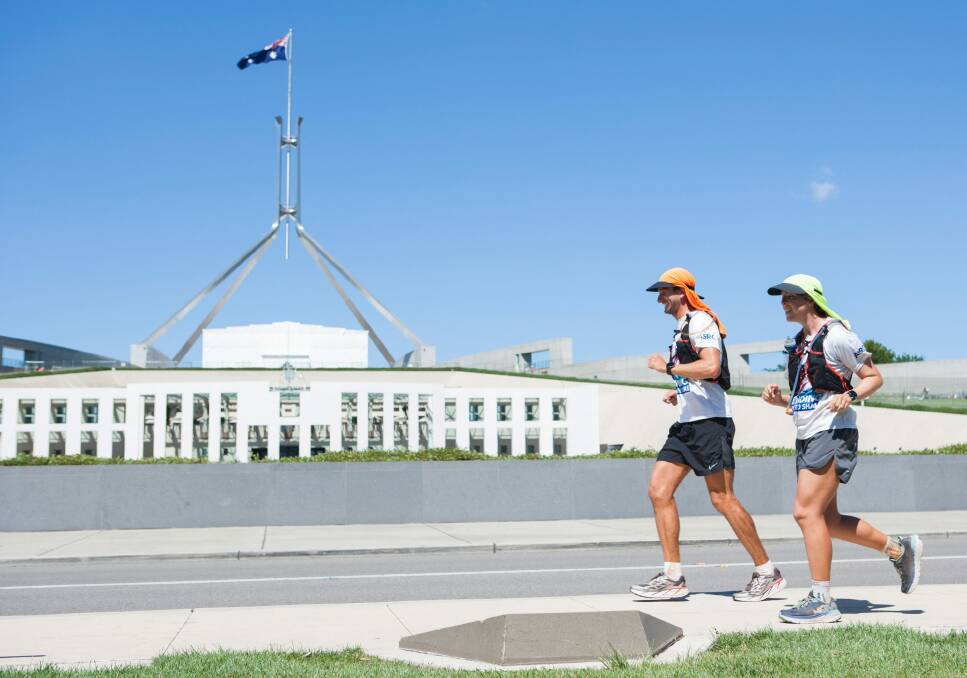 Jackson Bursill and Cassie Cohen arrive at Parliament House in Canberra during their run from Cooktown, Queensland to Melbourne, Victoria.  Photo: ANU
