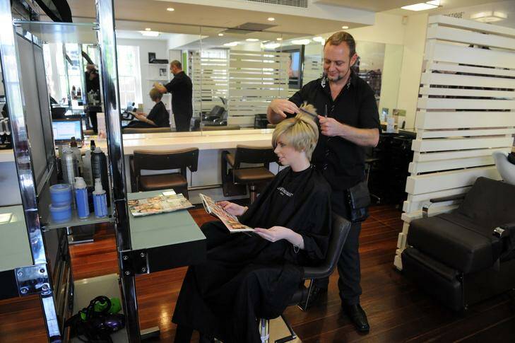 La Bimbi hairdressing manager Danny Grayswood at work at the salon in Acton. Photo: Richard Briggs