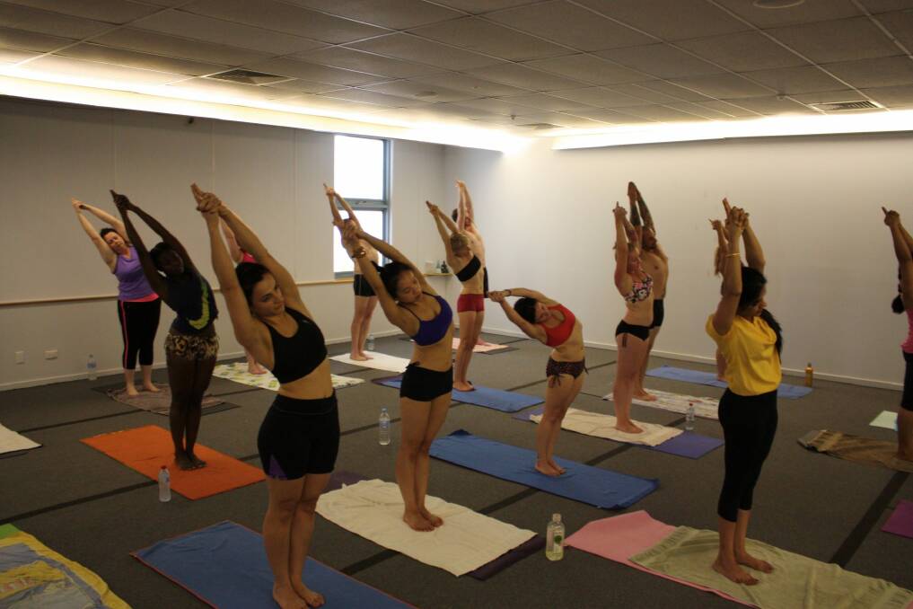 Heart rate: Each Bikram yoga class is conducted in a room heated to 38.5 degrees. Photo: Supplied