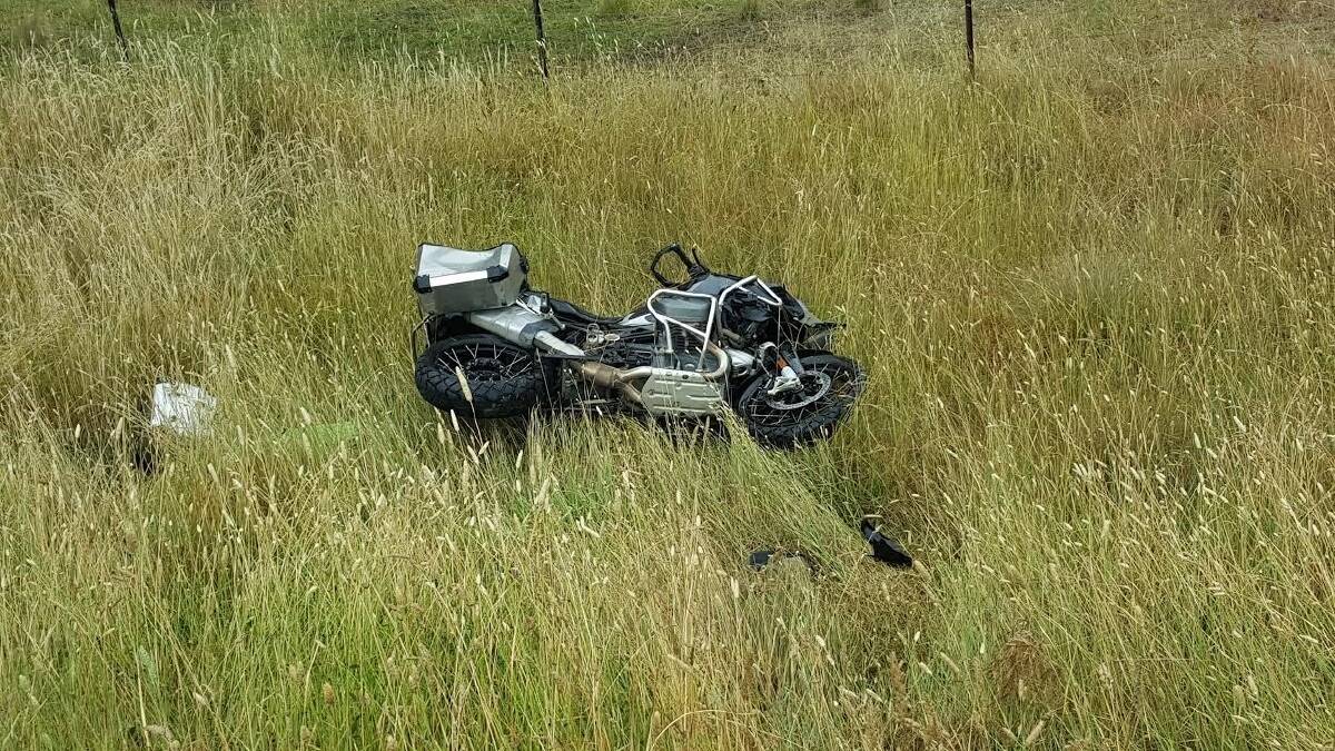 The damaged motorcycle beside the road after the accident that happened between Bombala and Cooma on Friday. Photo: Supplied