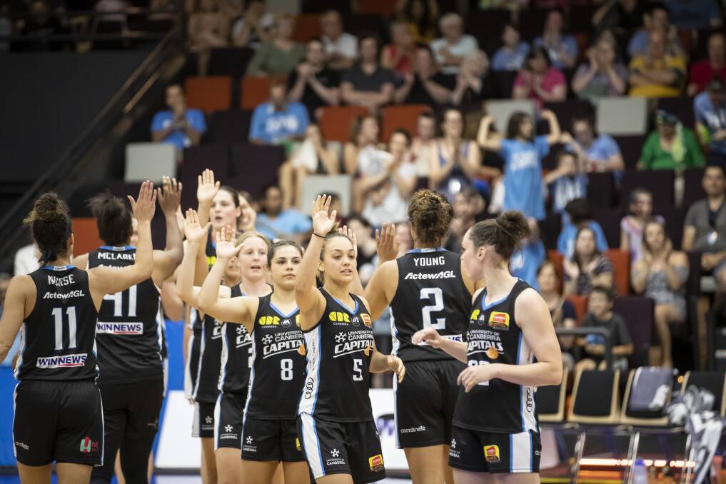 The Canberra Capitals say they need to win on the road to prove they're a title contender. Photo: Sitthixay Ditthavong