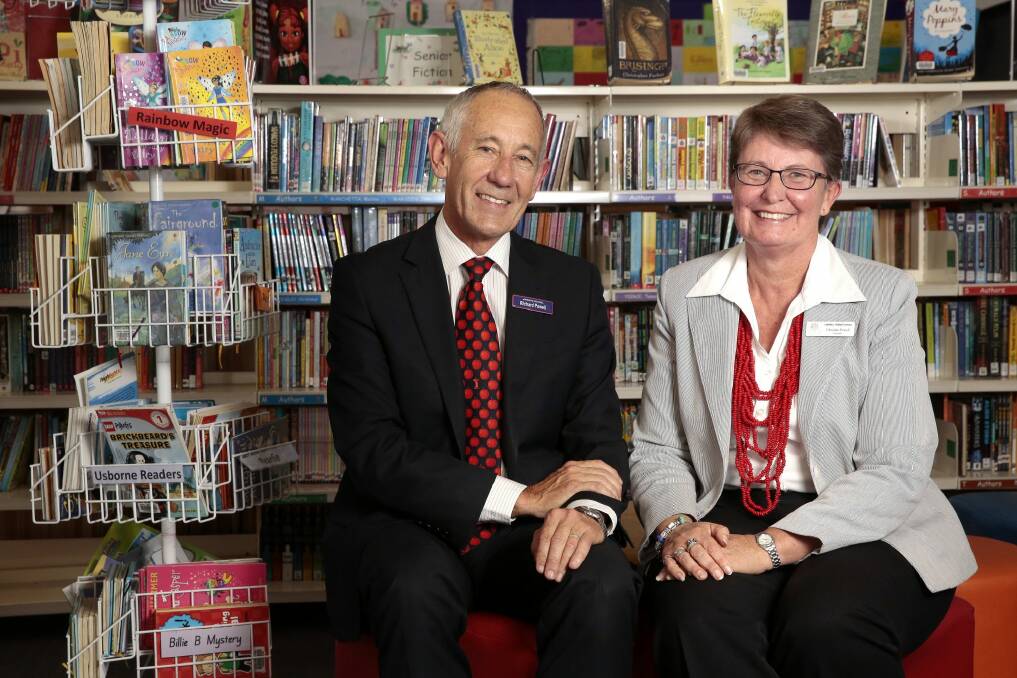 Amaroo School principal Richard Powell and his wife, Campbell Primary School principal Christine Powell, will retire together at the end of the year after 30 years in the ACT education system.     Photo: Jeffrey Chan
