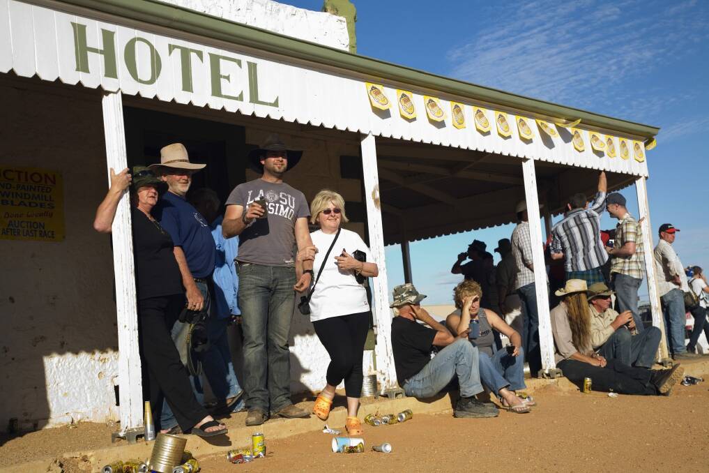 Drinkers at Birdsville Hotel during the annual Birdsville races in September. Photo: Andrew Watson