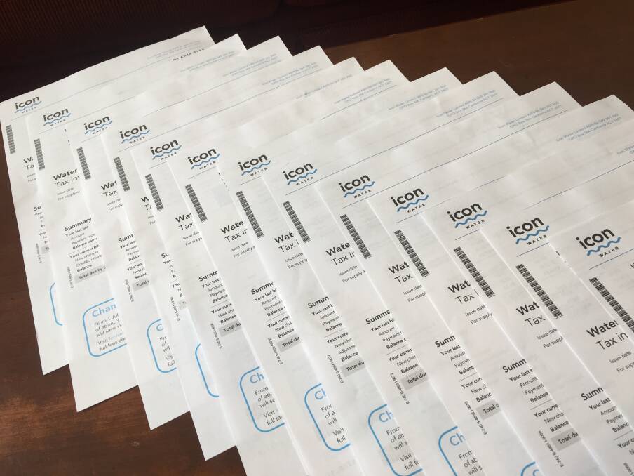 A Calwell resident received an envelope of 13 outstanding Icon Water bills, pictured, on Wednesday. Photo: Jasper Lindell