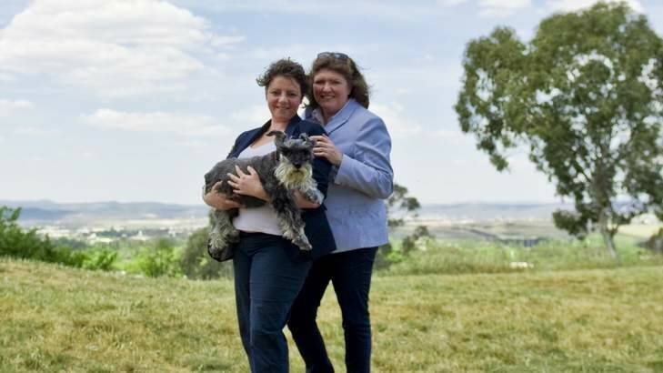Michelle Stockwell and Annabel Scholes with their dog Beau. Photo: Jay Cronan