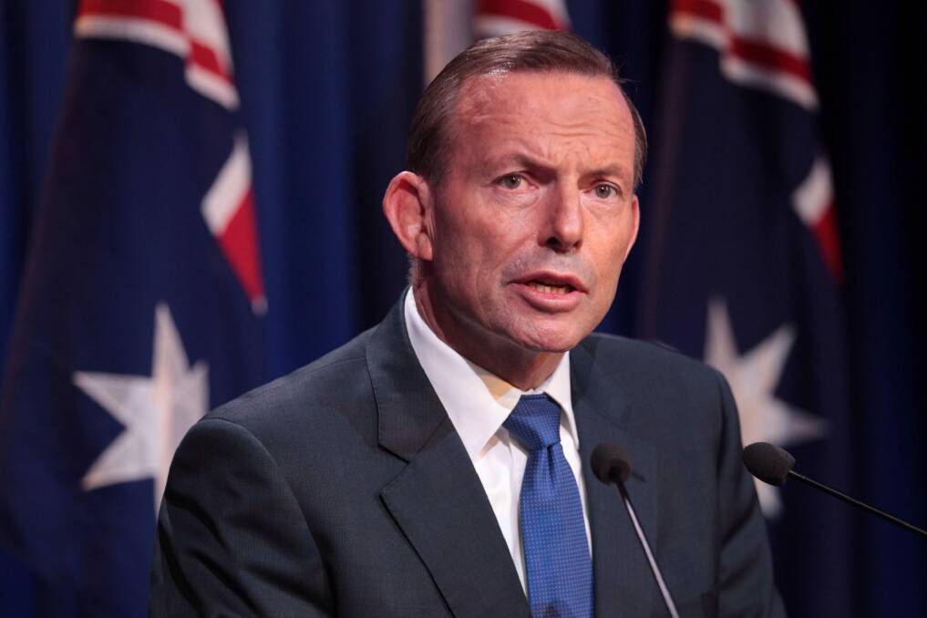 Tony Abbott faces sustained questioning in the party room on Tuesday - on issues such as Philip Ruddock's axing as chief government whip, children in detention and the government's submarines project. Photo: Andrew Meares