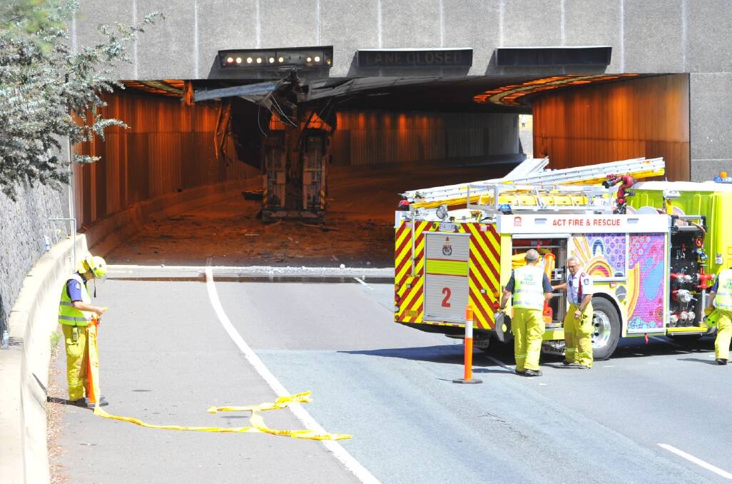 Parkes Way has been blocked after a truck damaged the roof of the tunnel. Photo: Jay Cronan