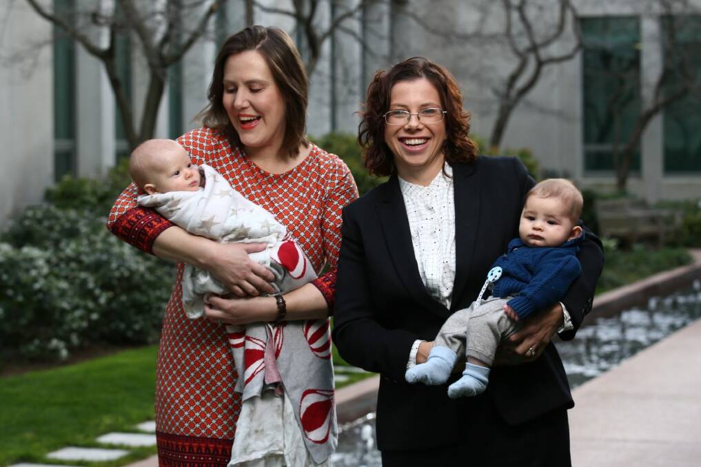 Kelly O'Dwyer with her daughter Olivia and Amanda Rishworth with her son Percy at Parliament House. Photo: Andrew Meares