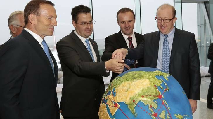 New era: Prime Minister Tony Abbott, Liberal senator Zed Seselja, ACT Deputy Chief Minister Andrew Barr and Canberra Airport managing director Stephen Byron. Photo: Jeffrey Chan