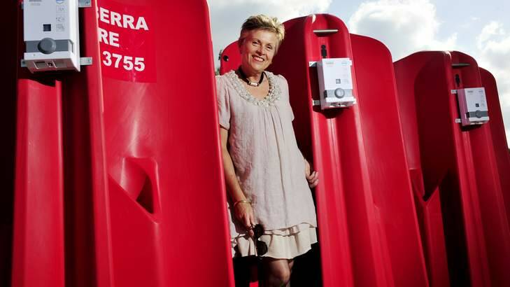 CEO of Canberra CBD limited Jane Easthope with the outdoor urinals. Photo: Jay Cronan