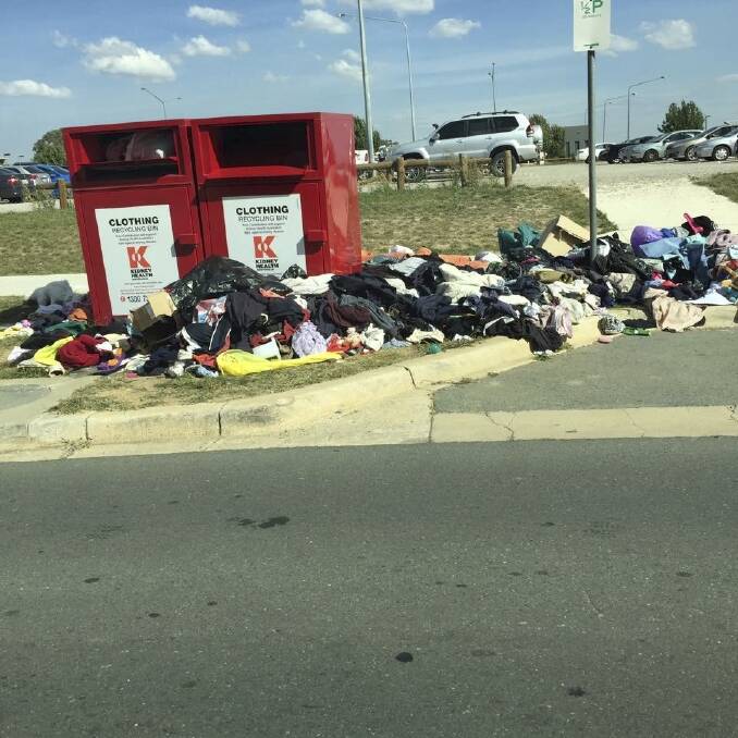 Charity bins in Gungahlin Place, with rubbish dumped illegally, photographed by a member of the public. Photo: Supplied