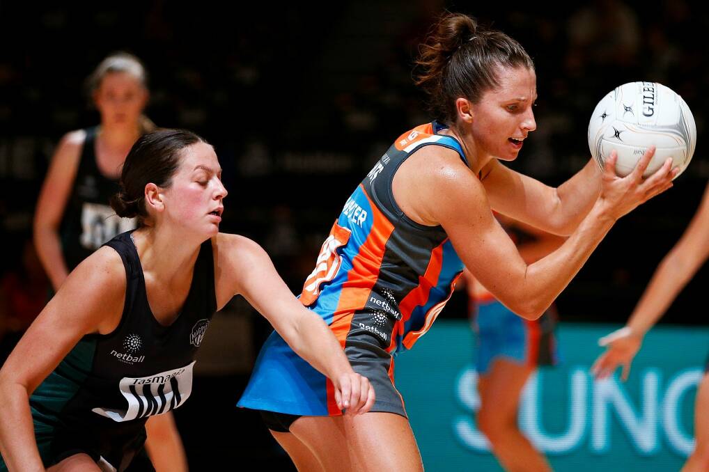 Big role: Amy Parmenter of the Giants makes a pass during the match between the Magpies and the Giants. Photo: Getty Images