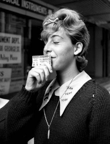 A fan with a ticket to the Beatles concert at Sydney Stadium during the Sydney leg of their Australian tour, 16 June 1964.