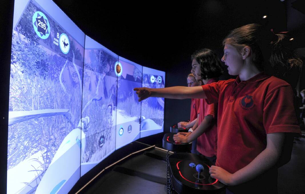 Students from Curtin Primary School try out Kspace at the National Museum of Australia. Photo: Graham Tidy