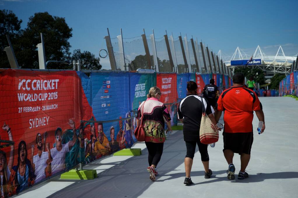 Pedestrians using the Albert "Tibby" Cotter Bridge over Anzac Parade during the Cricket World Cup in 2015. Photo: Wolter Peeters