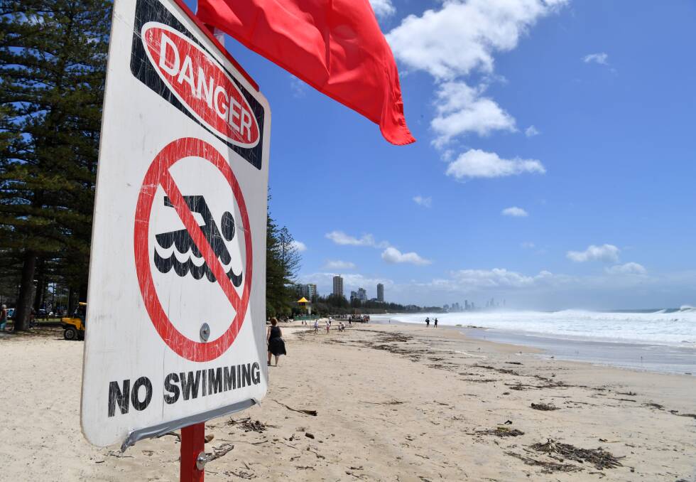 Burleigh Heads beach was among 34 closed on the Gold Coast at the weekend due to ex-Tropical Cyclone Oma. Photo: AAP Image/ Darren England