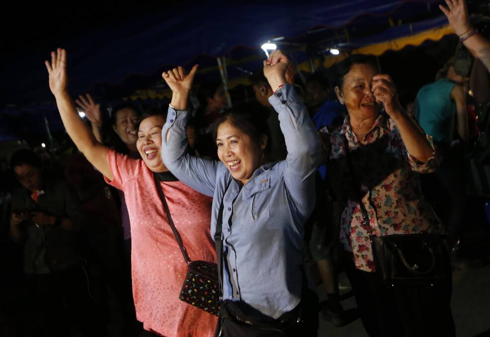Thais celebrate the rescue of the Wild Boars soccer team and their coach. Photo: AP