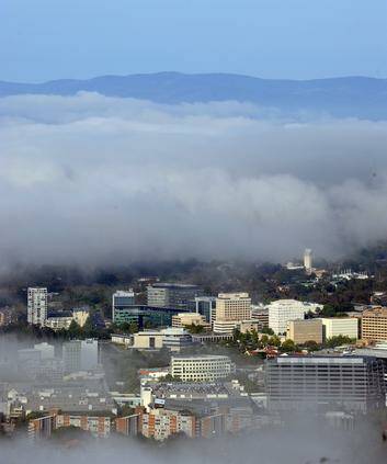 Fog settling over Canberra  early on Thursday morning. Photo: Katherine Griffiths