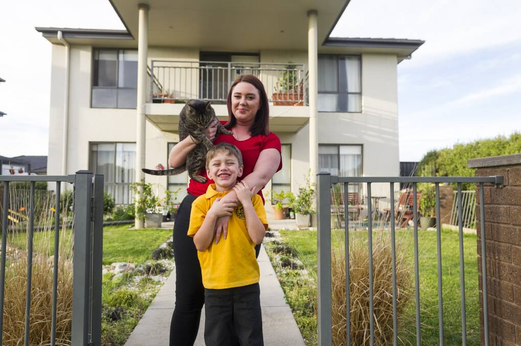 Cat Beerworth and son Lucas found their forever home in Bungendore. High house prices in Canberra forced the single mother to look across the border.  Photo: Dion Georgopoulos