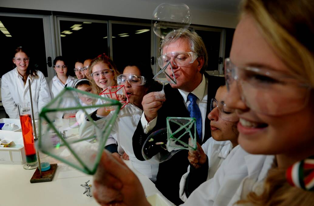 Canberra Girls Grammar students with Nobel Prize winner Brian Schmidt at the opening of a science wing at the school in 2012. Photo: Melissa Adams