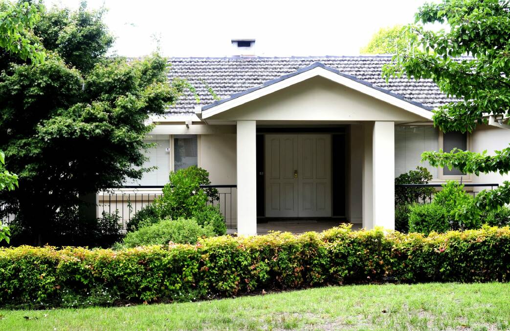 A home in Canberra's Mugga Way, where an alleged murder took place in 2012, is on the market. Photo: Melissa Adams