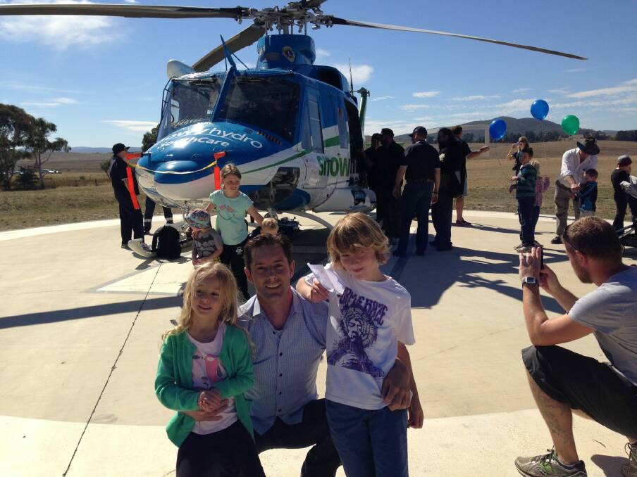 New Snowy Hydro SouthCare helicopter chief executive Chris Kimball with his children Violet and Noah. Photo: Supplied