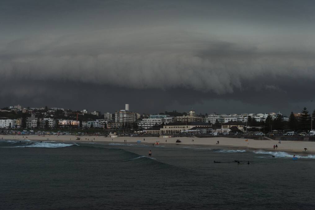 The storm front passes over Bondi Beach. Photo: James Brickwood