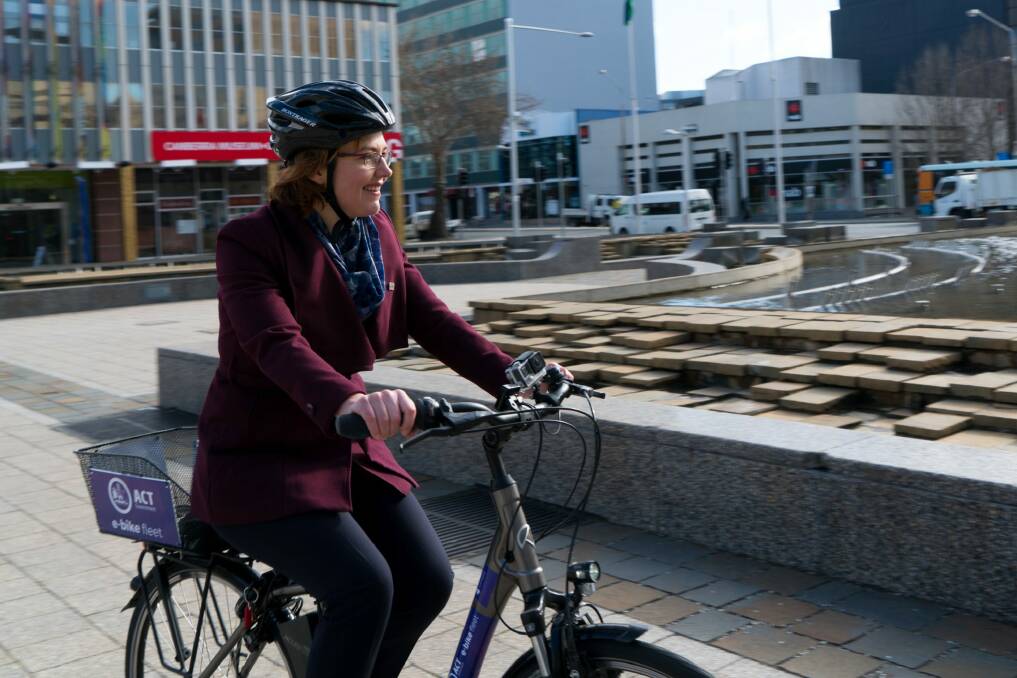 Transport minister Meegan Fitzharris rides a bicycle in Civic Square as part of a push to get more women on bikes. Photo: Dylan Jones